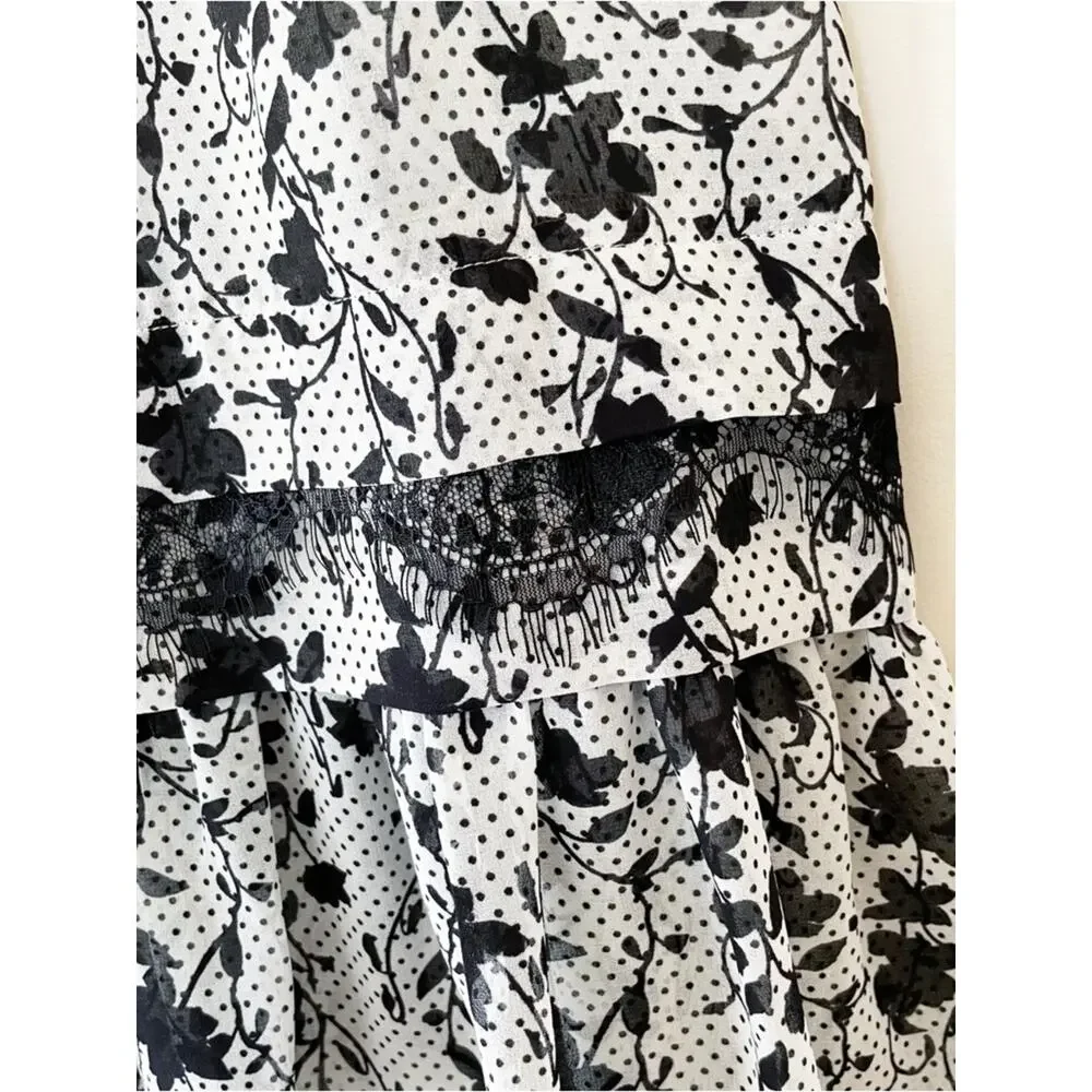 CAbi Black & White Floral Ruffle Tiered Tank Size Medium LIKE NEW